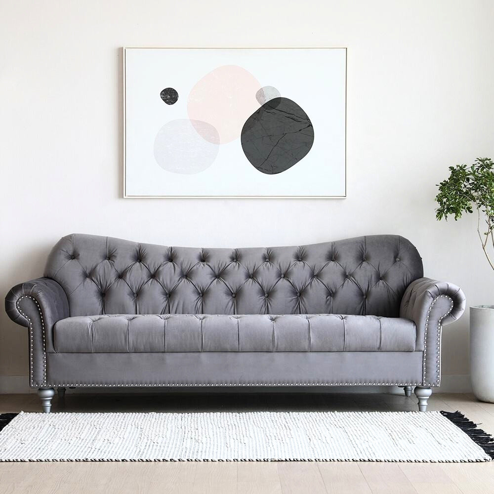 Tre-sitsig Chesterfield-soffa med knappar